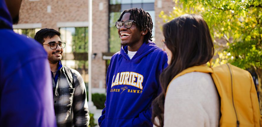 A group of smiling students.